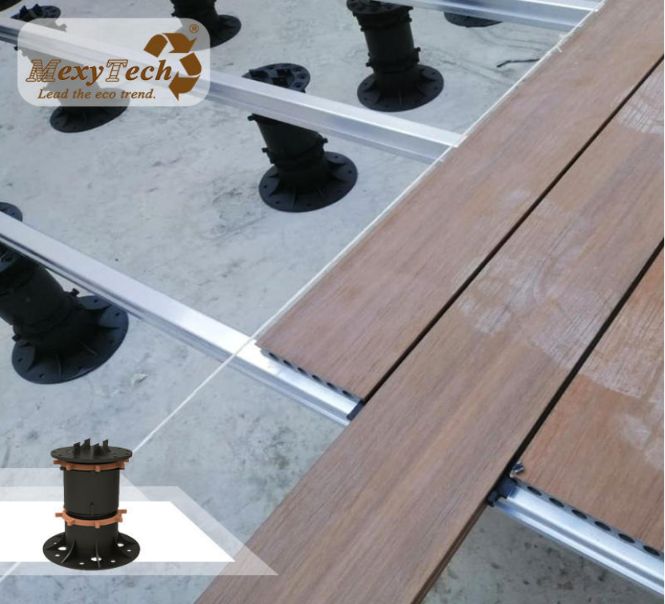Composite decking installation with aluminum joists and adjustable pedestals by MexyTech, showing WPC deck boards aligned with proper spacing for outdoor projects