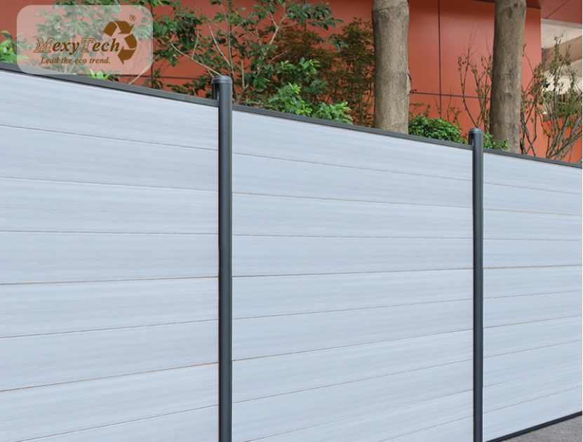 mexytech light gray composite fence panels with black aluminum posts in a modern outdoor landscape setting