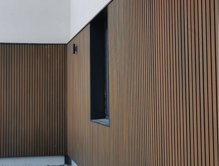 mexytech Composite Wall Cladding with narrow vertical slat design installed on a contemporary exterior wall
